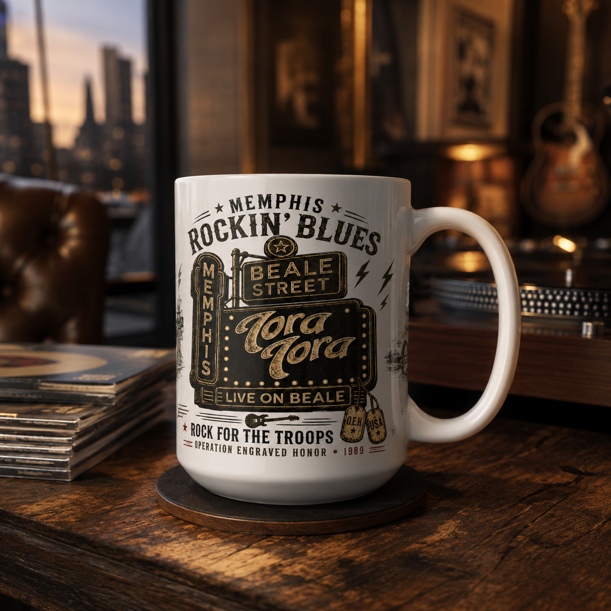 Official Tora Tora Rock for the Troops ceramic mug on a wooden table with records, guitar, and warm Memphis music room background.