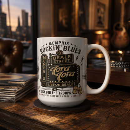 Official Tora Tora Rock for the Troops ceramic mug on a wooden table with records, guitar, and warm Memphis music room background.