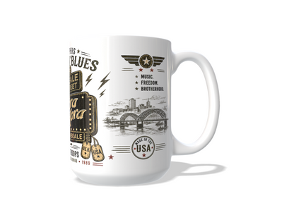 Official Tora Tora Memphis Rockin’ Blues mug artwork with Beale Street marquee, guitar, stars, lightning bolts, and Rock for the Troops design.