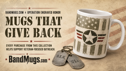 Mug with American flag design and dog tags on a beige background, featuring BandMugs.com branding.